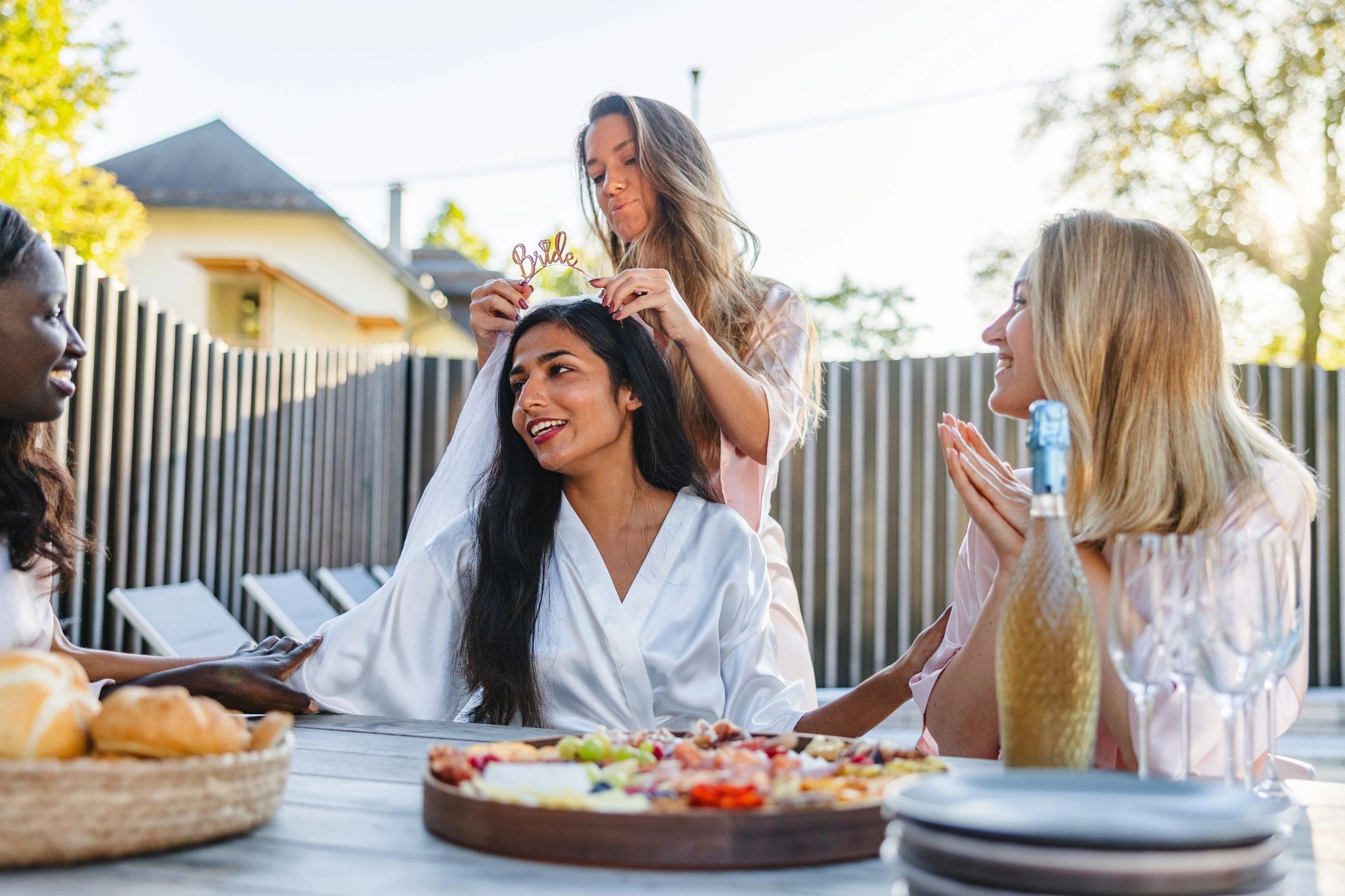 Bride-to-be celebrating with friends at a stylish event